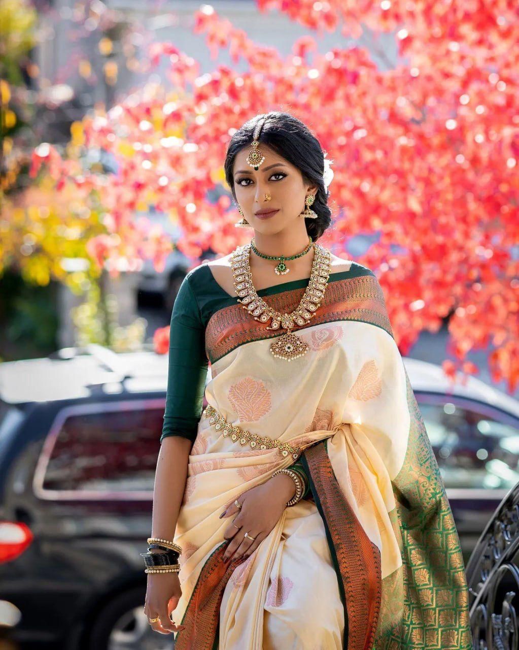 Cynosure Beige Soft Silk Saree With Inspiring Blouse Piece KP Main image