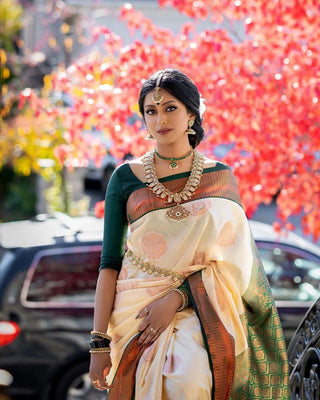 Cynosure Beige Soft Silk Saree With Inspiring Blouse Piece KP