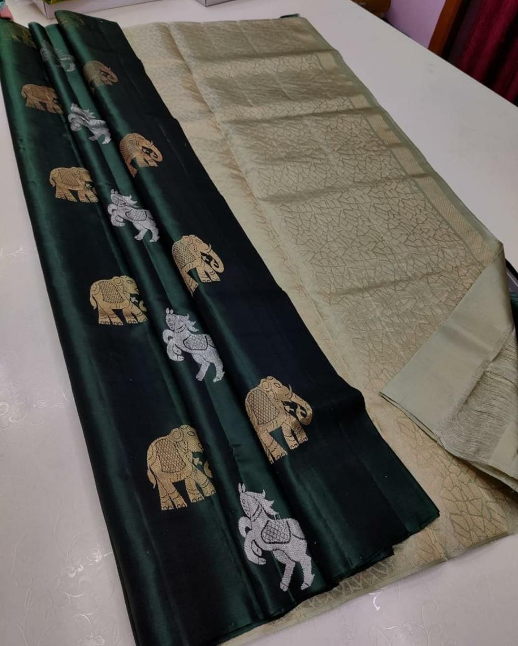 Cynosure Green Soft Silk Saree With Alluring Blouse Piece KP
