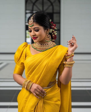 Bewitching Yellow Soft Silk Saree with Energetic Blouse Piece KPR