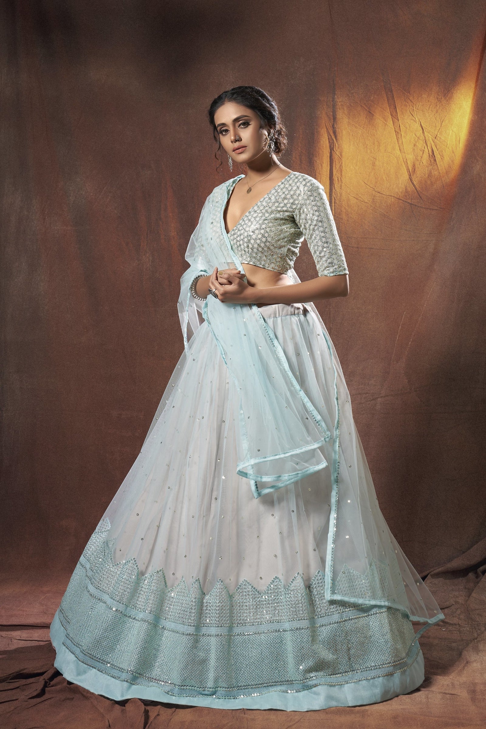 Light Blue Pakistani Net Lehenga Choli For Indian Festivals & Weddings - Sequence Embroidery Work, Resham Embroidery Work, Clothsvilla