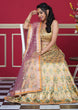 Load image into Gallery viewer, Lime Yellow Pakistani Silk Lehenga Choli For Indian Festival &amp; Weddings - Print Work, Swarovski Work Clothsvilla