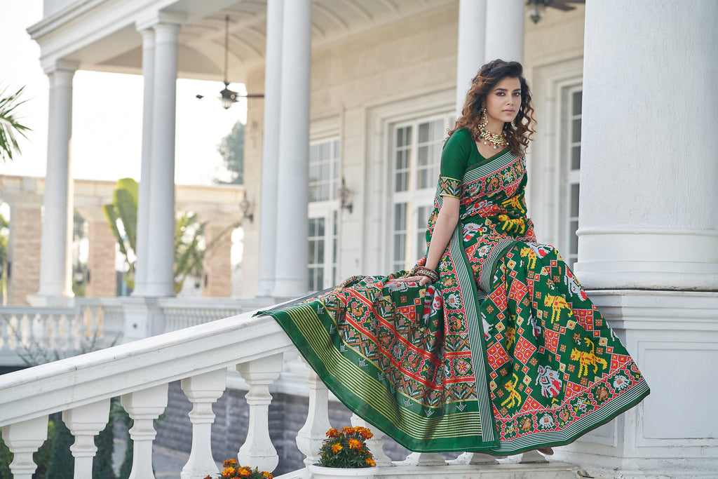 Lovable Green Weaving Patola Silk Wedding Wear Saree ClothsVilla