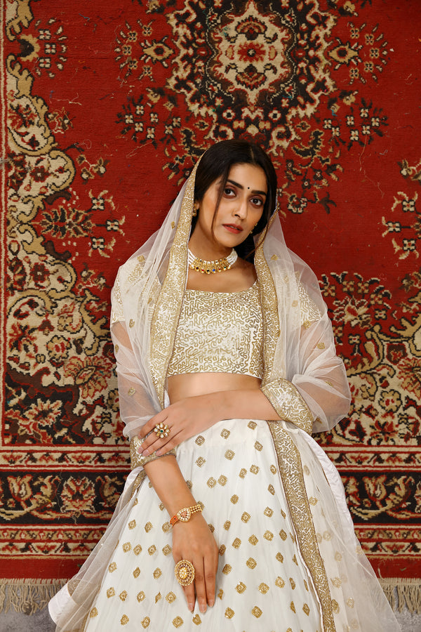 Marvelous White Sequins Embroidered Net Semi Stitched Wedding Lehenga ClothsVilla