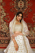 Load image into Gallery viewer, Marvelous White Sequins Embroidered Net Semi Stitched Wedding Lehenga ClothsVilla