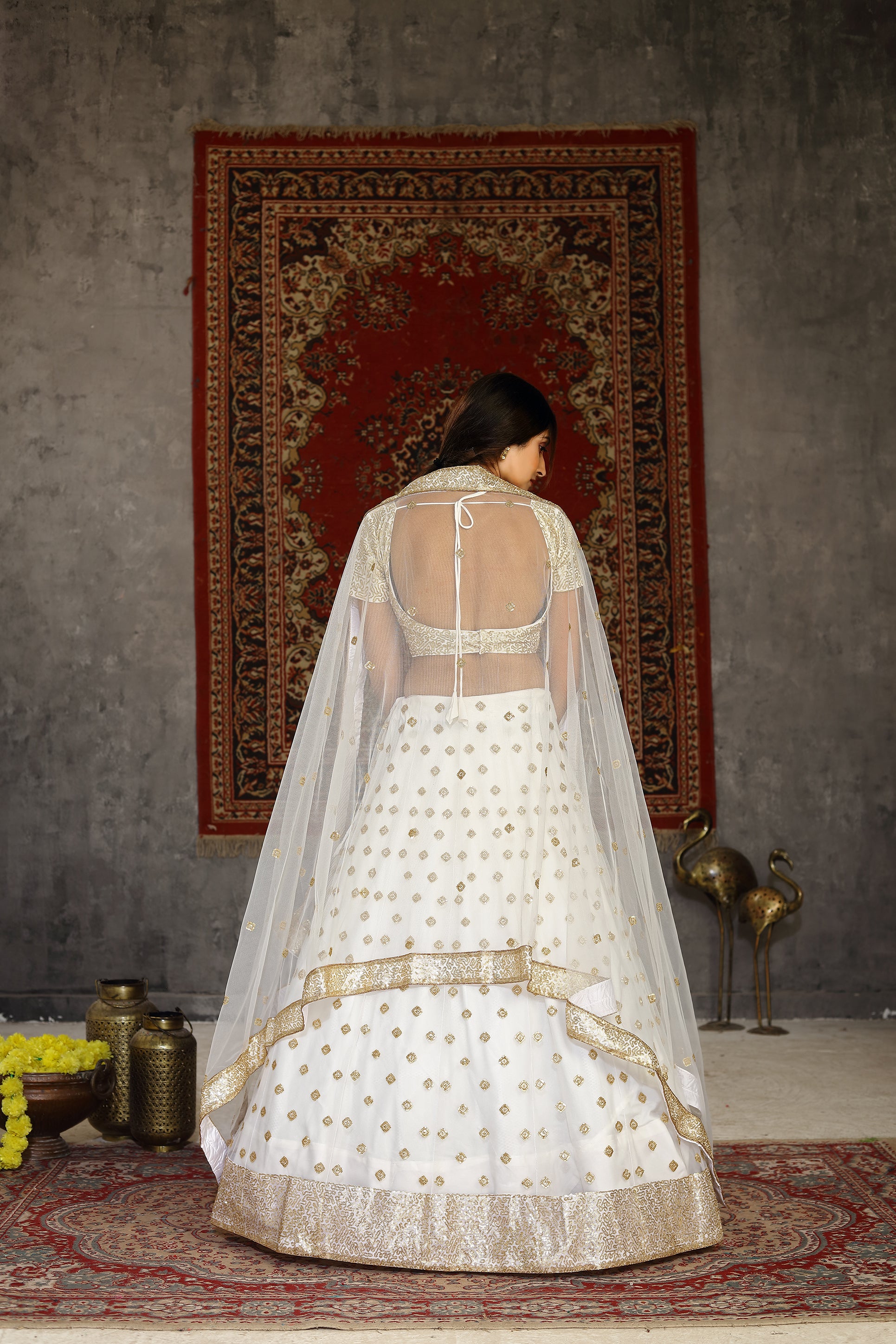 Marvelous White Sequins Embroidered Net Semi Stitched Wedding Lehenga ClothsVilla