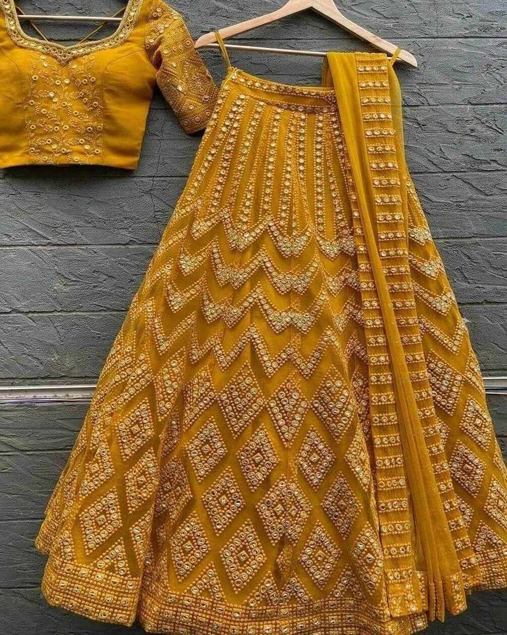 Mustered Yellow Lehenga Choli in Georgette With Embroidery Work Clothsvilla