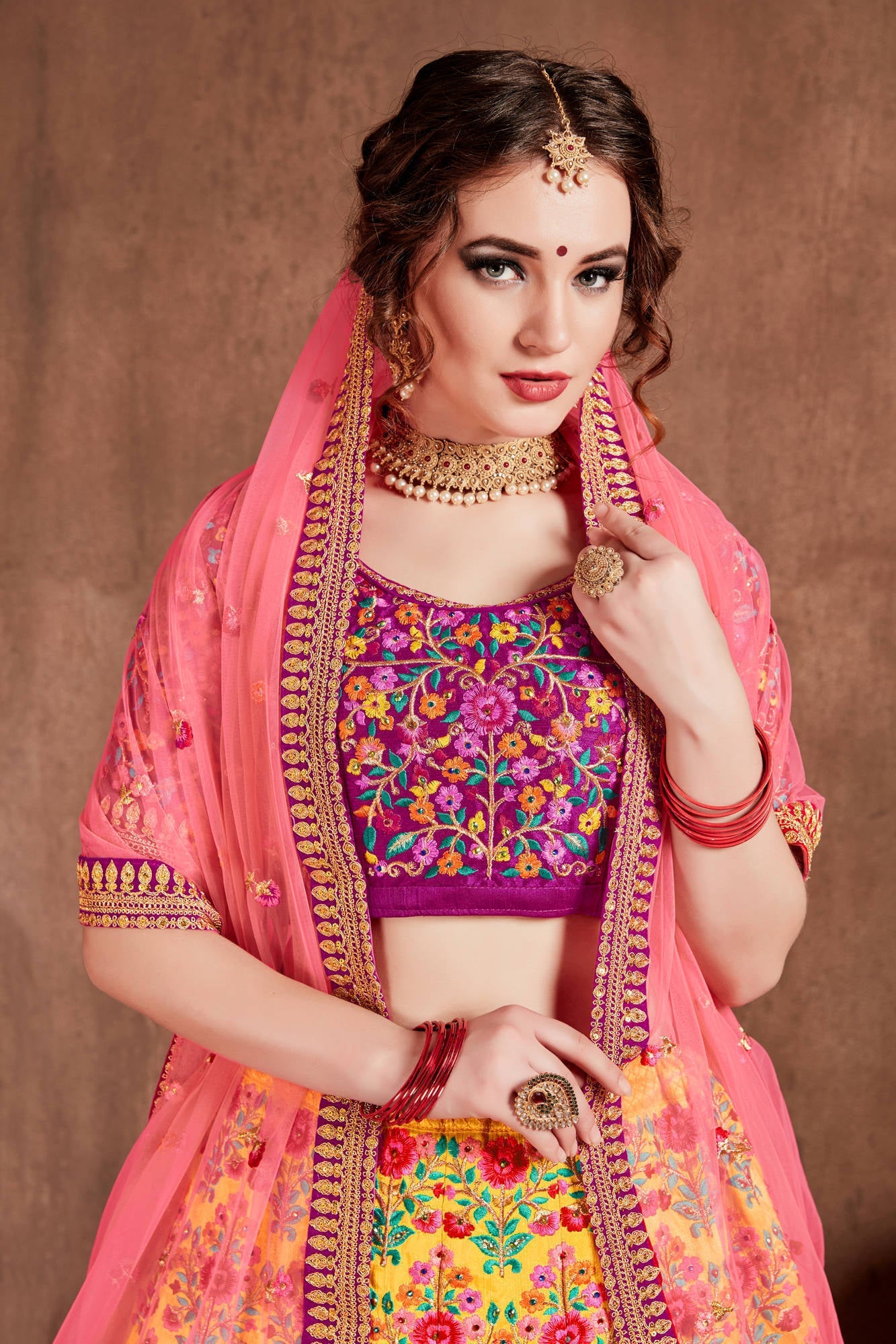 Lovely Yellow Colored Bridal Wear Embroidered Lehenga Choli Clothsvilla