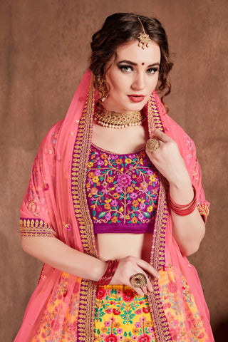Lovely Yellow Colored Bridal Wear Embroidered Lehenga Choli Clothsvilla