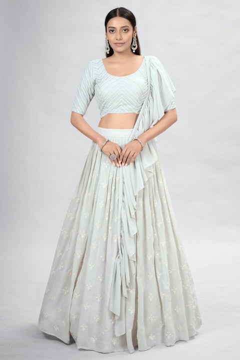 Off White Indian Georgette Lehenga Choli With Ruffle Dupatta For Indian Festival & Weddings - Sequence Embroidery Work, Clothsvilla Main image