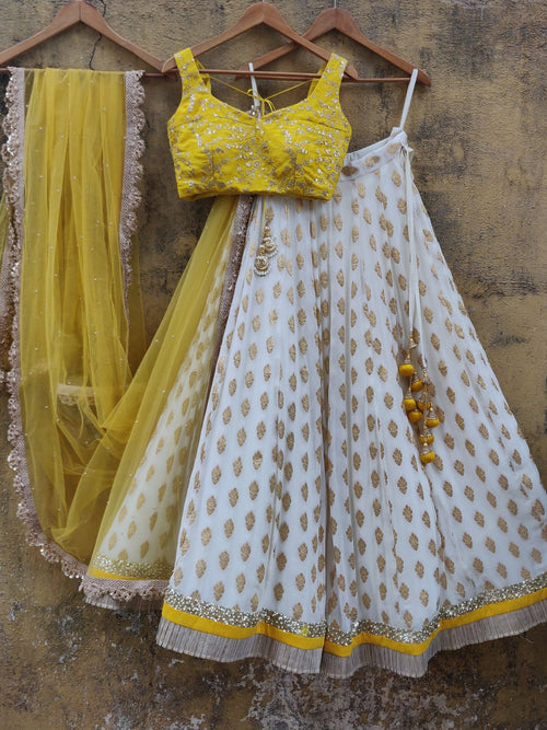 White color Banarasi Silk Lehenga Choli with Yellow Net Dupatta ClothsVilla