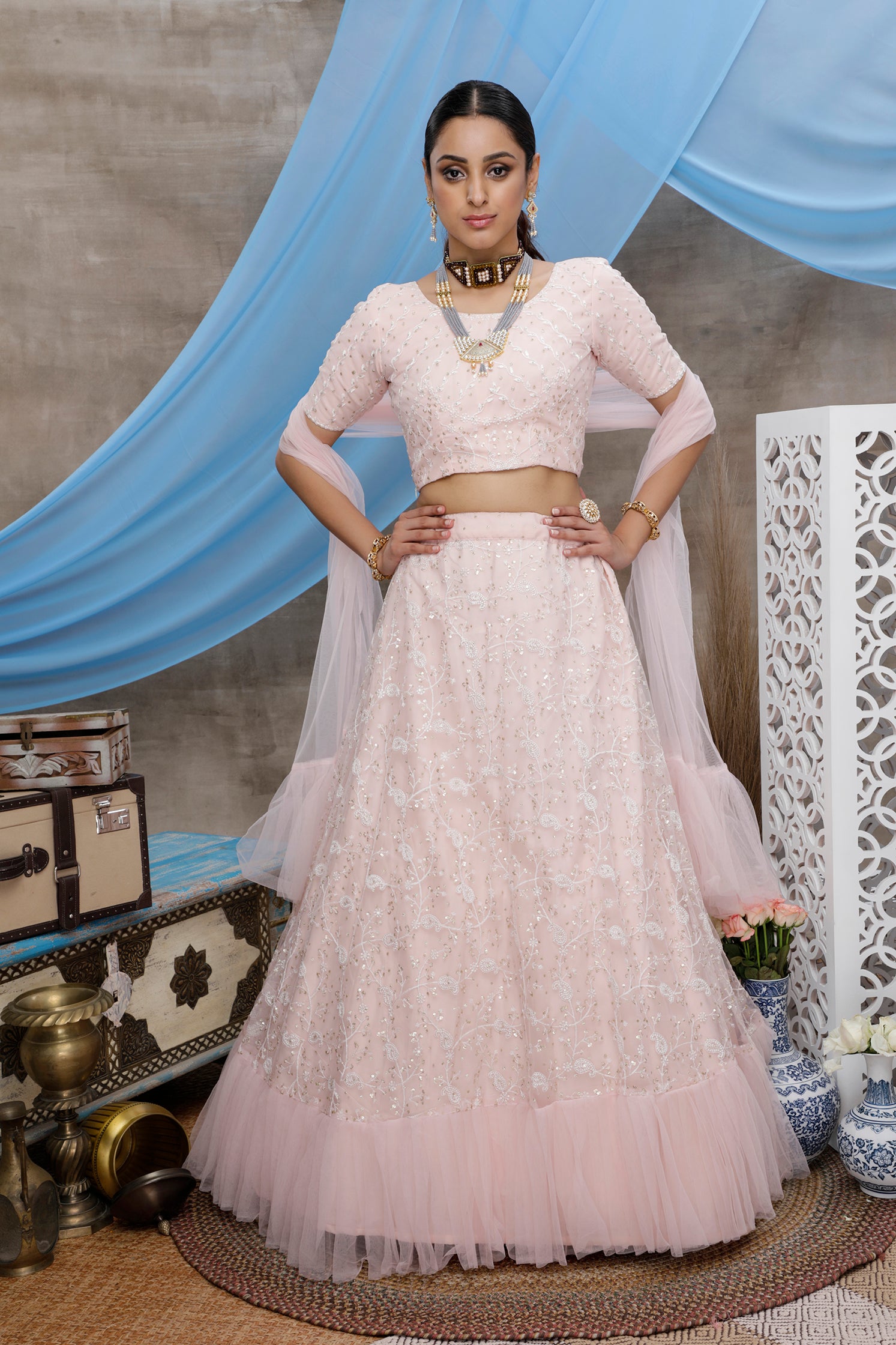 Peach Thread And Sequence Embroidered Net Semi Stitched Bridal Lehenga ClothsVilla Main image