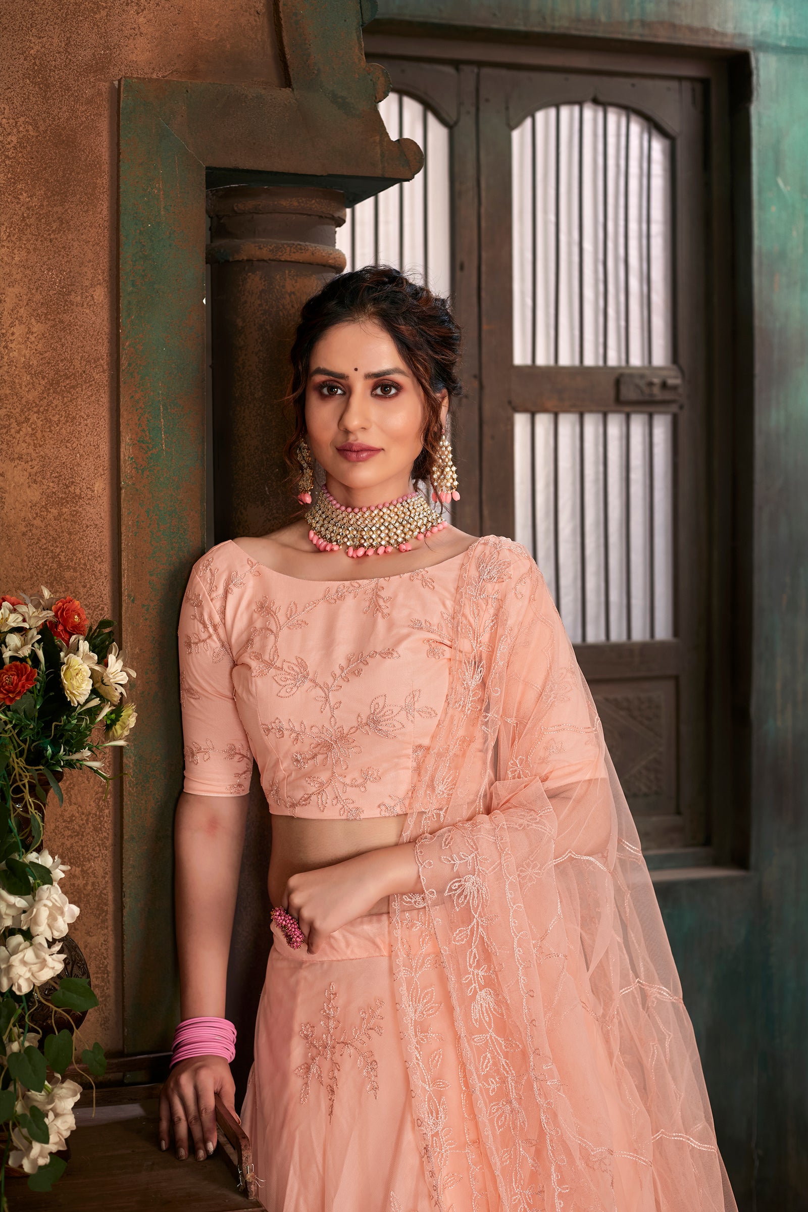 Peach Thread Embroidered Net Wedding Wear Lehenga Choli ClothsVilla