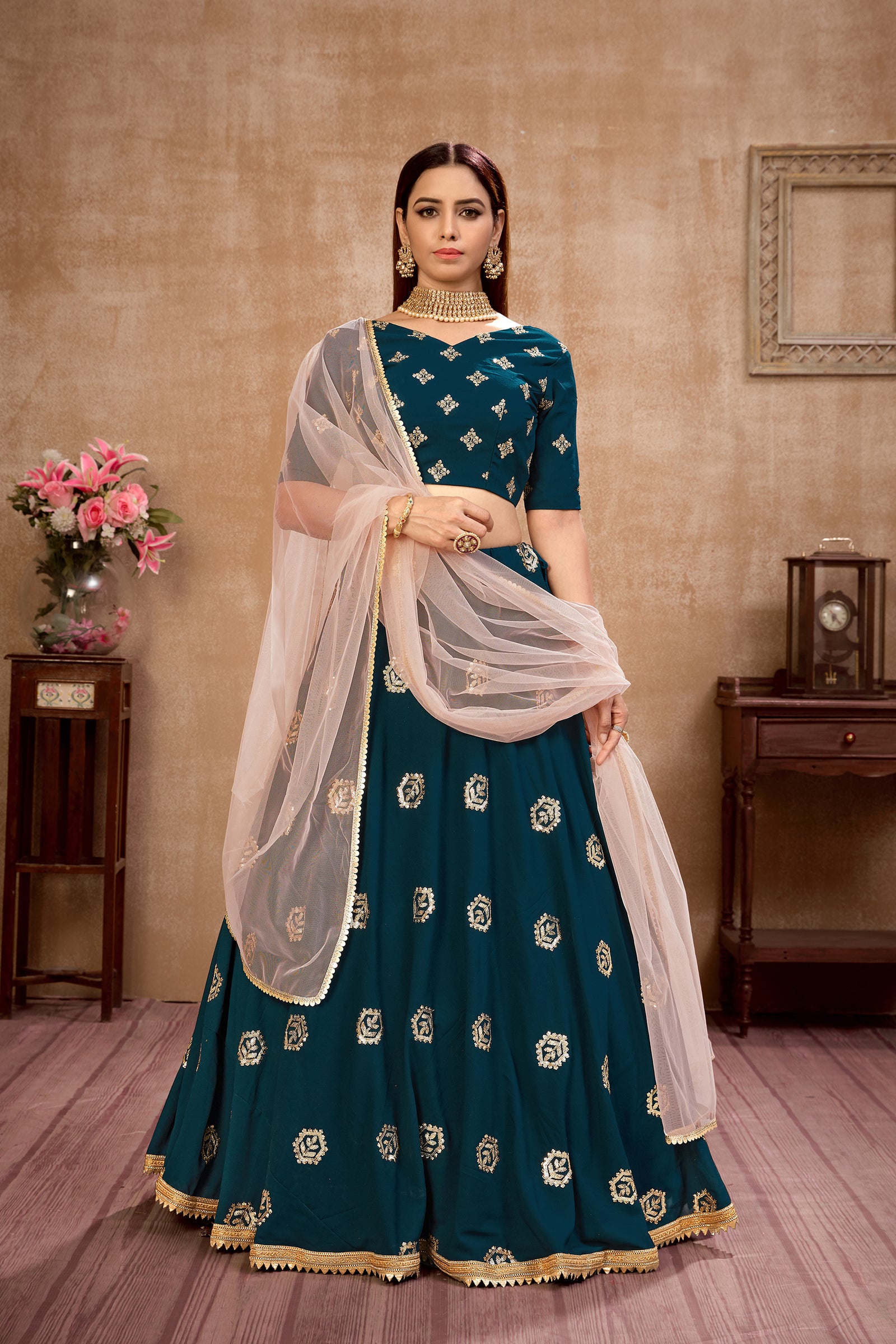 Peacock Blue Georgette Lehenga Choli With Net Dupatta ClothsVilla