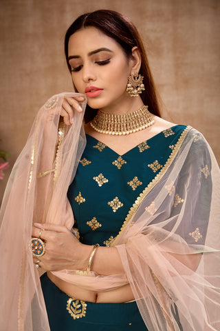 Peacock Blue Georgette Lehenga Choli With Net Dupatta ClothsVilla