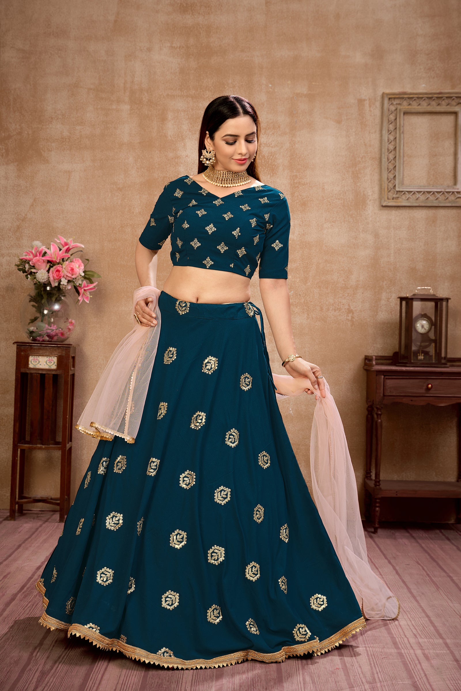 Peacock Blue Georgette Lehenga Choli With Net Dupatta ClothsVilla