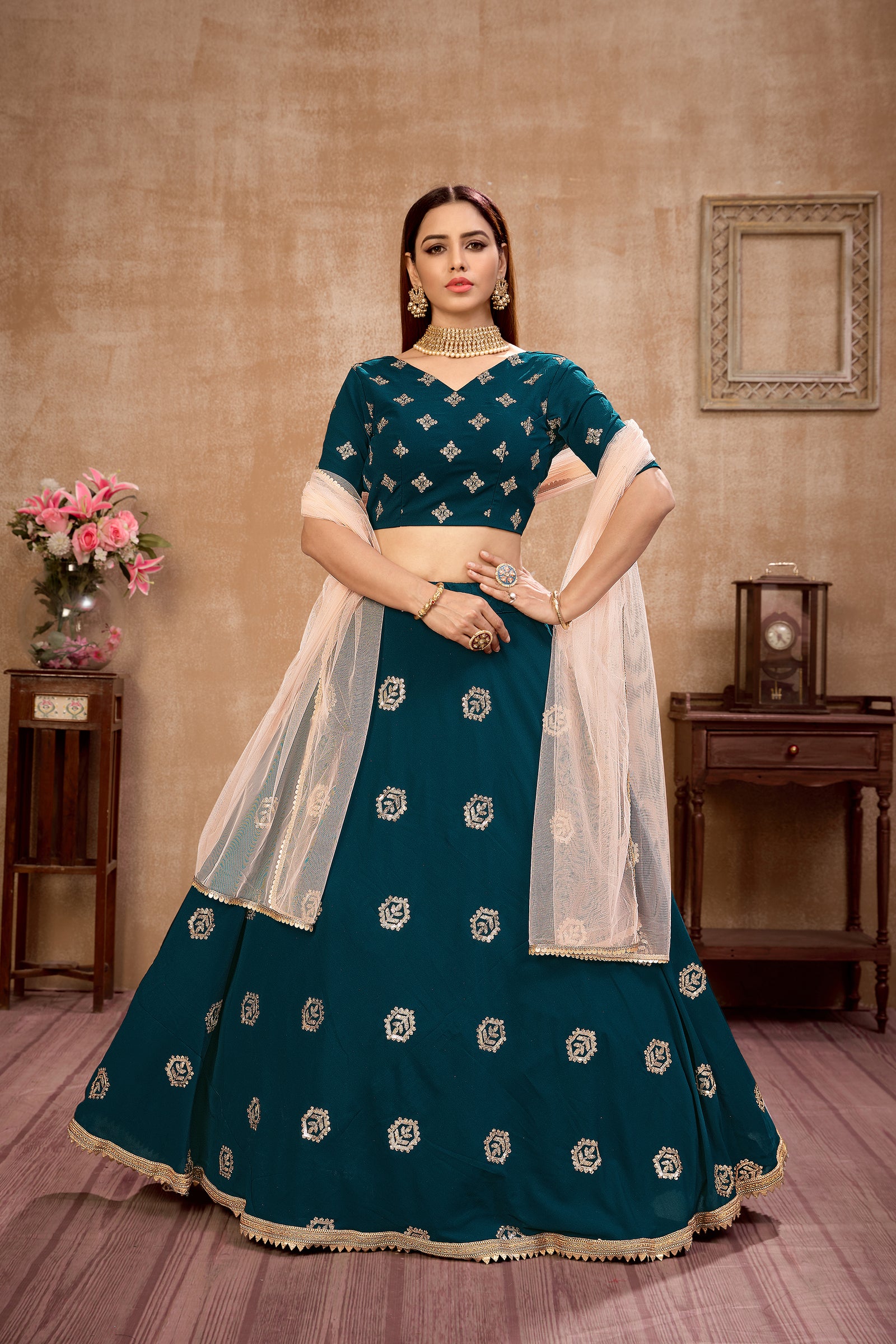 Peacock Blue Georgette Lehenga Choli With Net Dupatta ClothsVilla