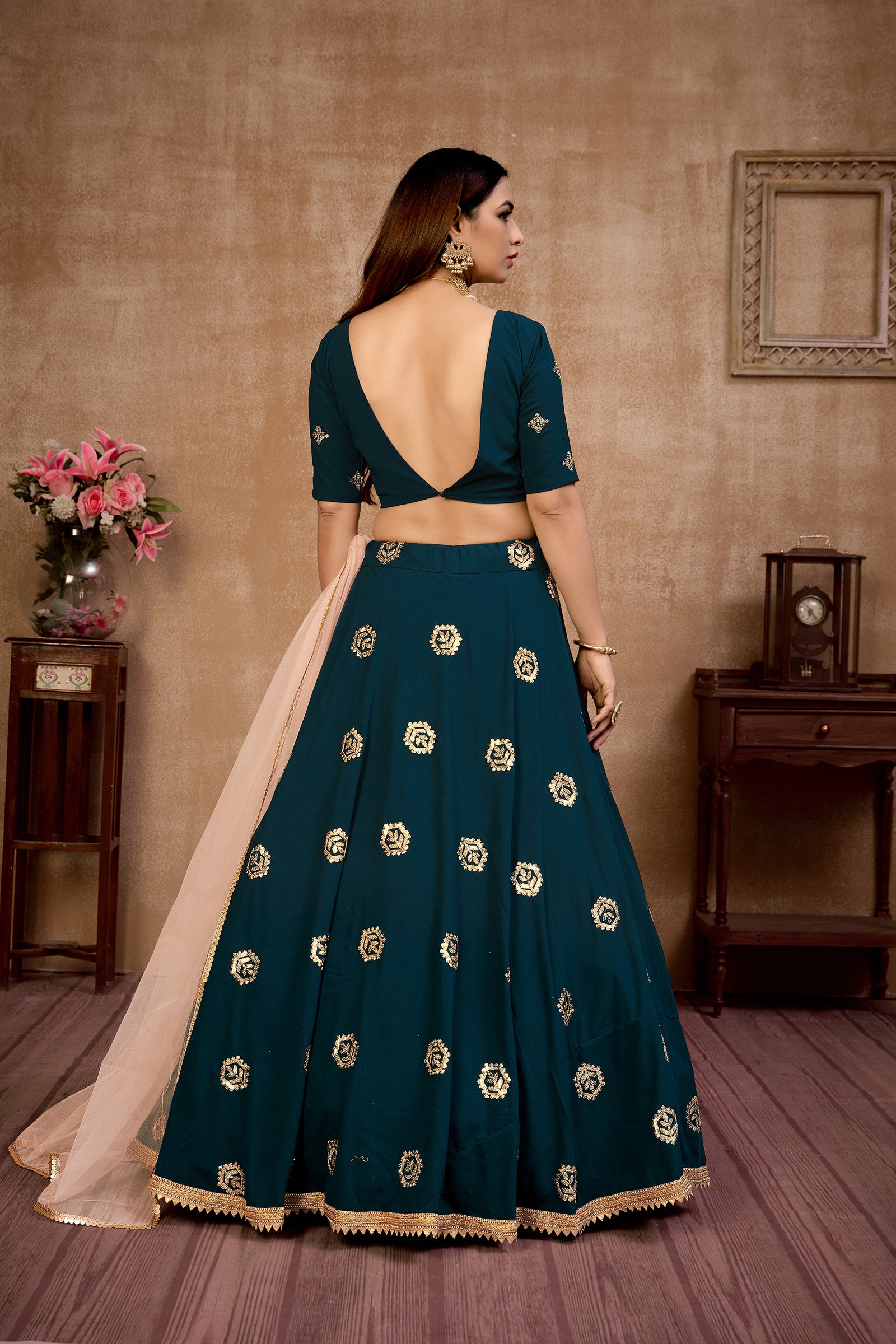Peacock Blue Georgette Lehenga Choli With Net Dupatta ClothsVilla