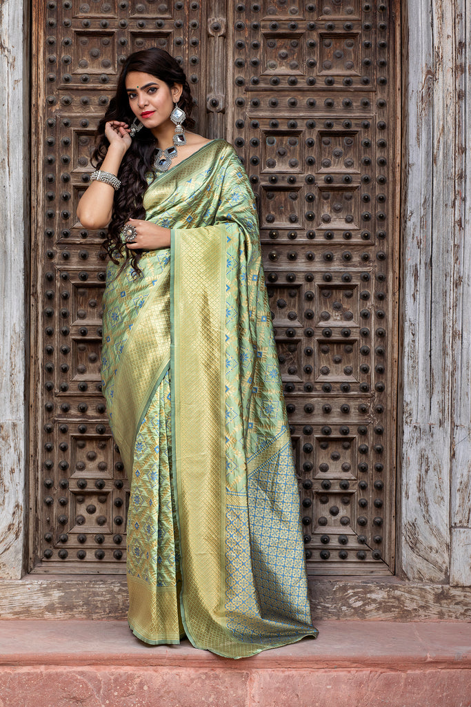Pista Green Golden Weaving Banarasi Silk Wedding Wear Saree ClothsVilla