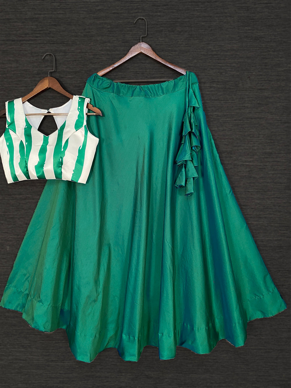 Green Color Taffeta Satin Silk Lehenga Choli With Net Dupatta Clothsvilla