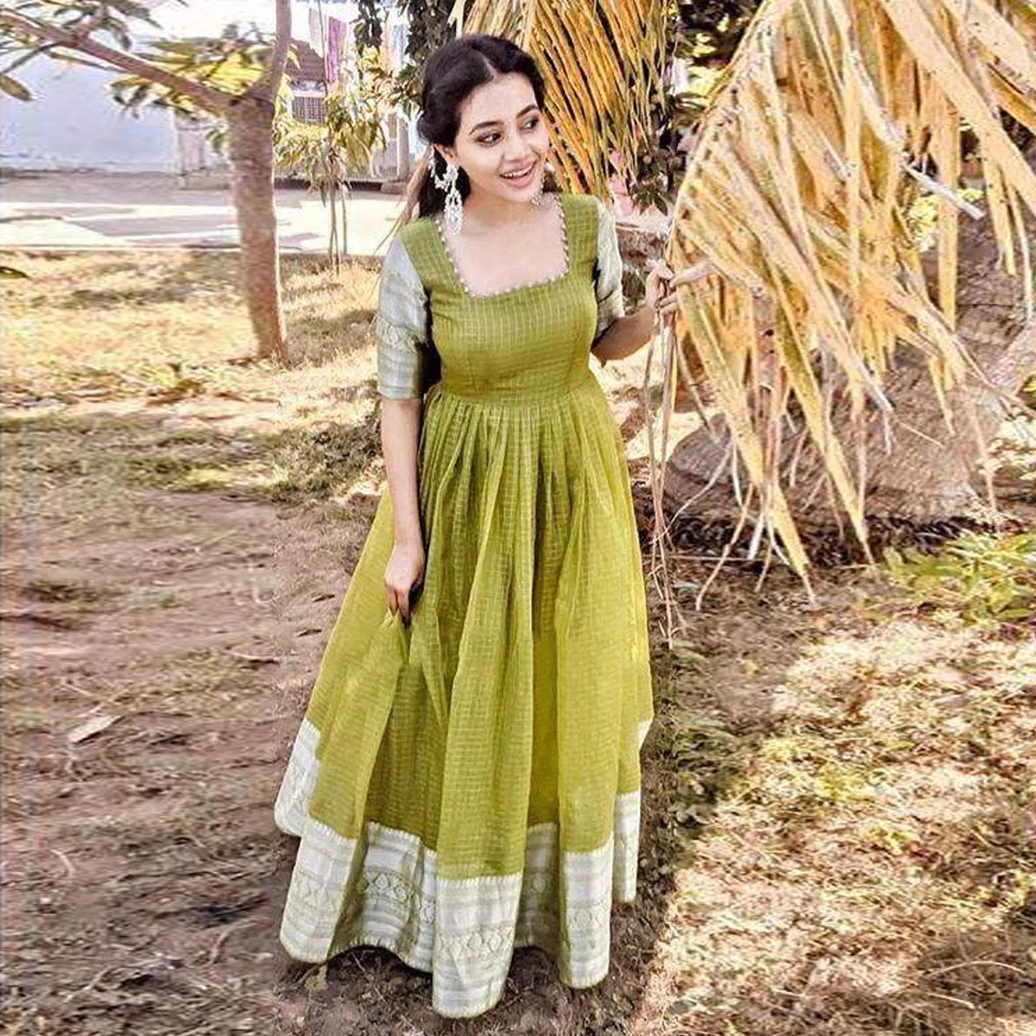 Pleasant Parrot Green Colored Partywear Woven Organza Gown ClothsVilla Main image