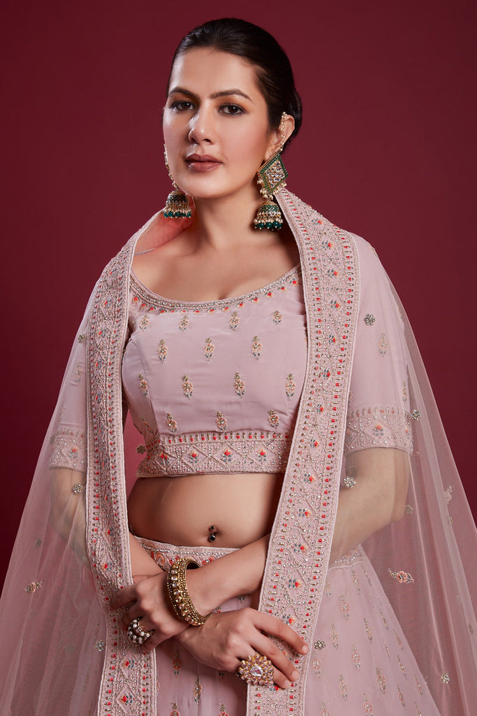 Vibrant Peach Color Georgette Lehenga With Embroidered and Zarkan Work Clothsvilla