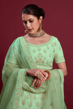 Load image into Gallery viewer, Radiant Sea Green Georgette Lehenga With Sparkling Zarkan Embellishments for Special Occasions Clothsvilla