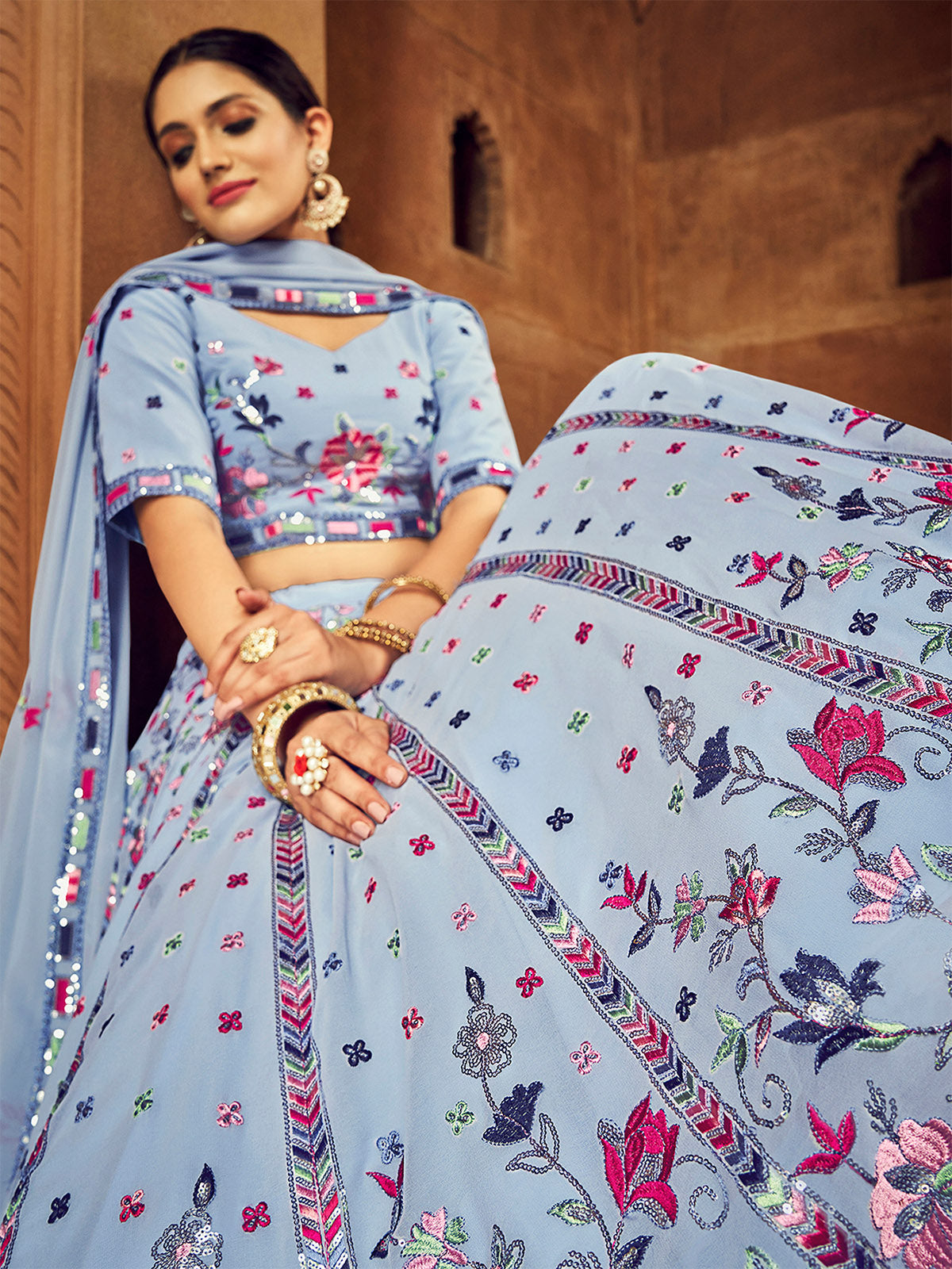 Sky Blue Thread And Sequins Embroidered Georgette Festive & Party Wear Semi Stitched Lehenga Clothsvilla