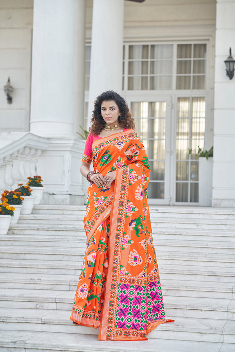 Seductive Orange Weaving Patola Silk Wedding Wear Saree ClothsVilla Main image