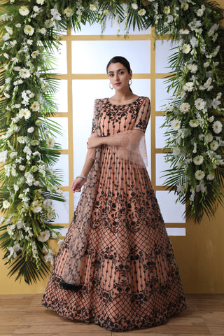Sensational Peach Colored Soft Net Base Festive Wear Designer Gown ClothsVilla