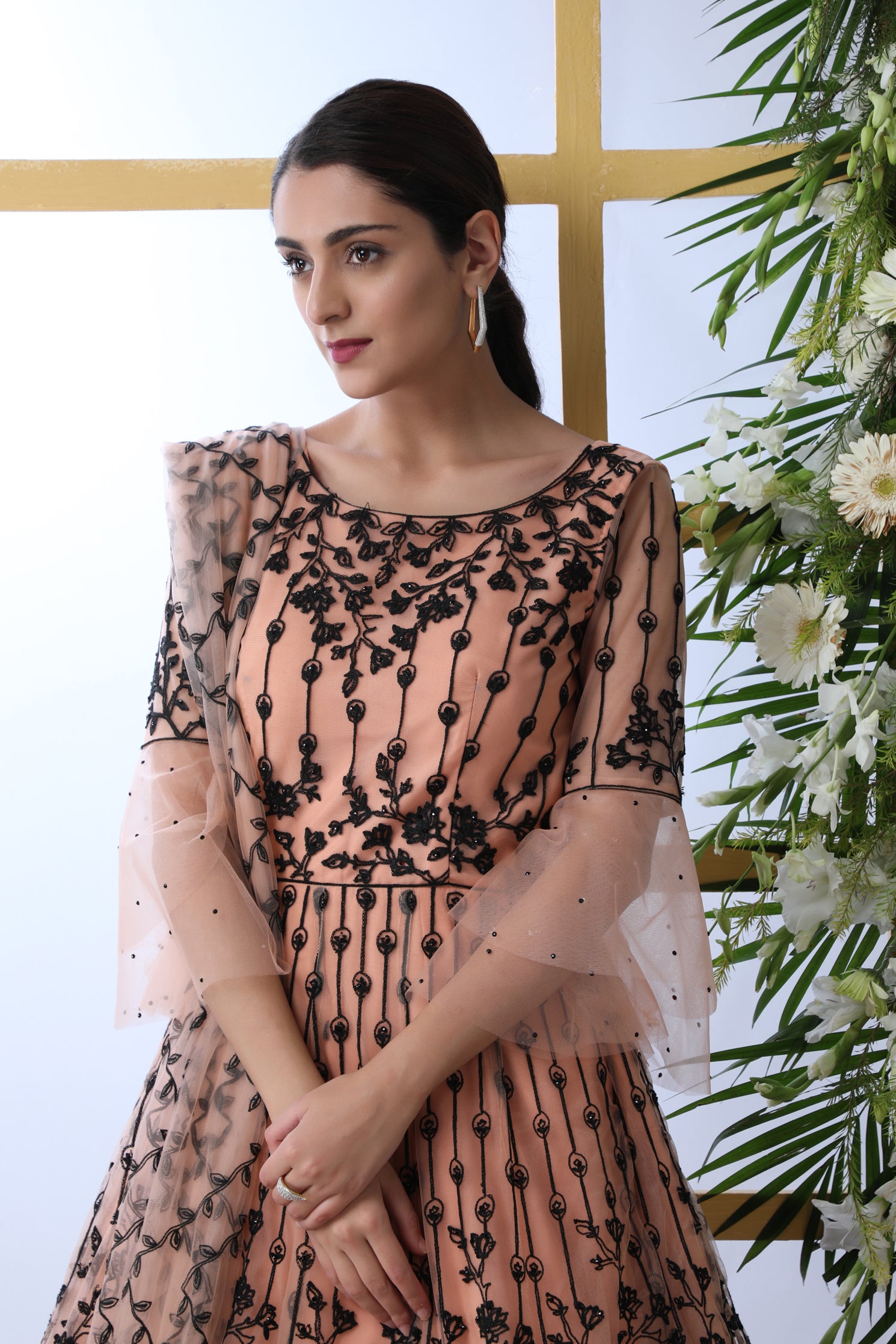 Sensational Peach Colored Soft Net Base Festive Wear Designer Gown ClothsVilla