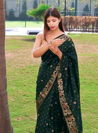 Embrocation Dark Green Soft Banarasi Silk Saree With Elision Blouse Piece Shriji