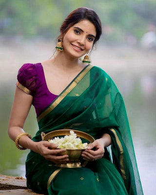 Gratifying Green Cotton Silk Saree With Flaunt Blouse Piece Shriji