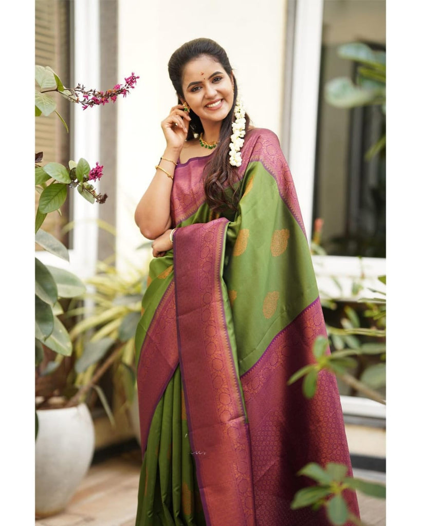 Artistic Green Soft Silk Saree With Supernal Blouse Piece Shriji