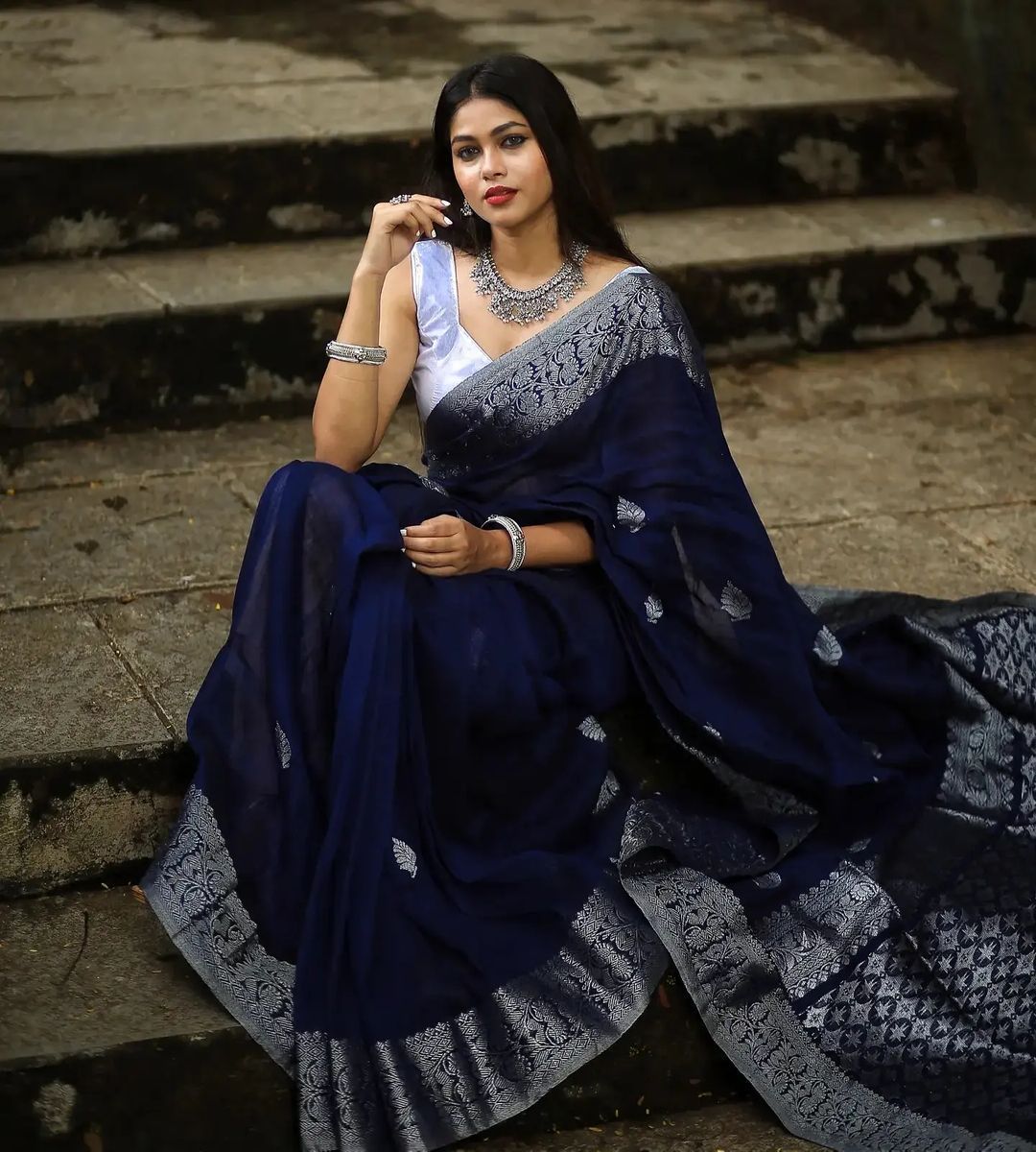 Engrossing Navy Blue Soft Silk Saree With Glowing Blouse Piece Shriji Main image
