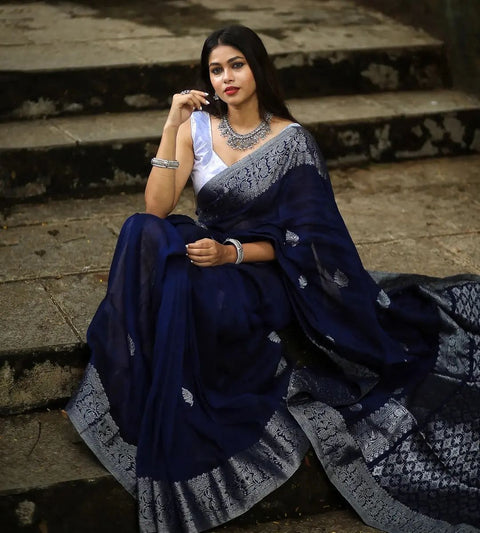 Engrossing Navy Blue Soft Silk Saree With Glowing Blouse Piece Shriji Main image