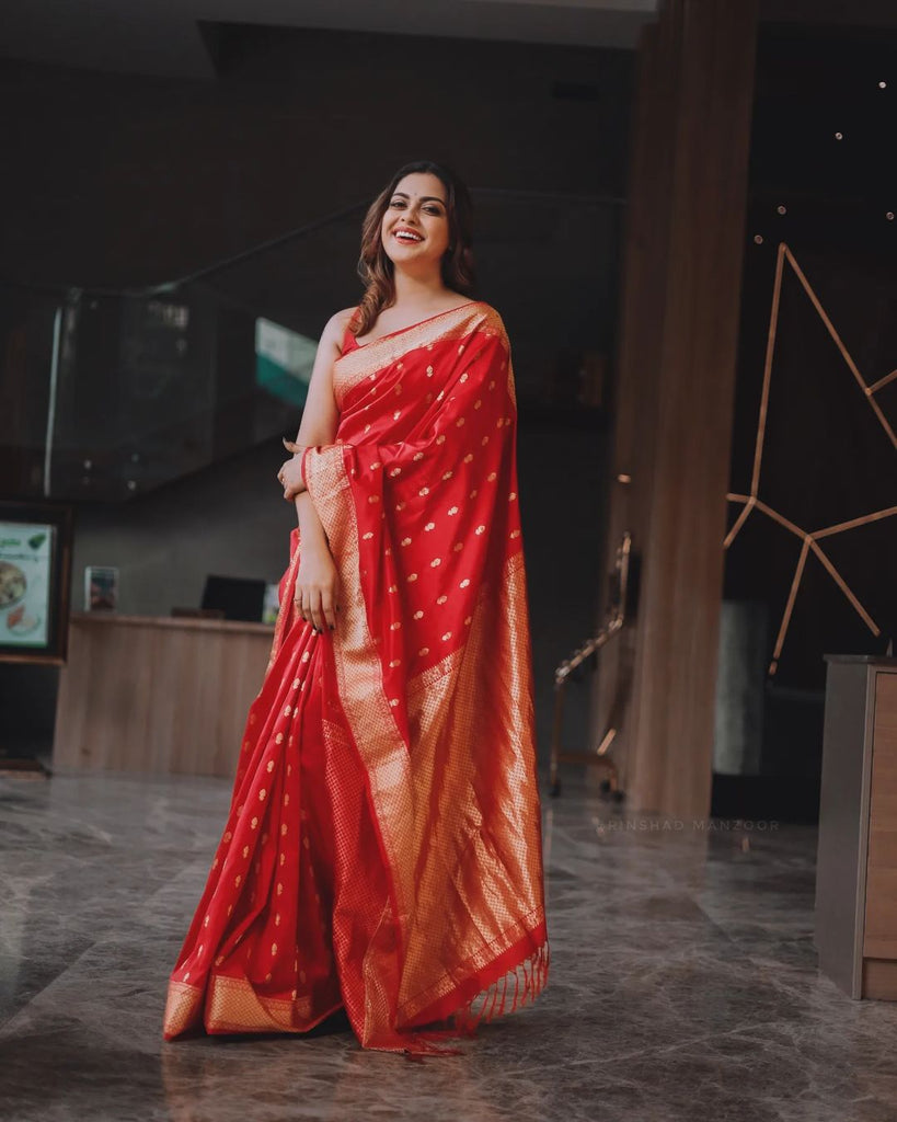 Cynosure Red Soft Banarasi Silk Saree With Demesne Blouse Piece Shriji