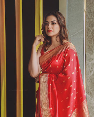 Cynosure Red Soft Banarasi Silk Saree With Demesne Blouse Piece Shriji
