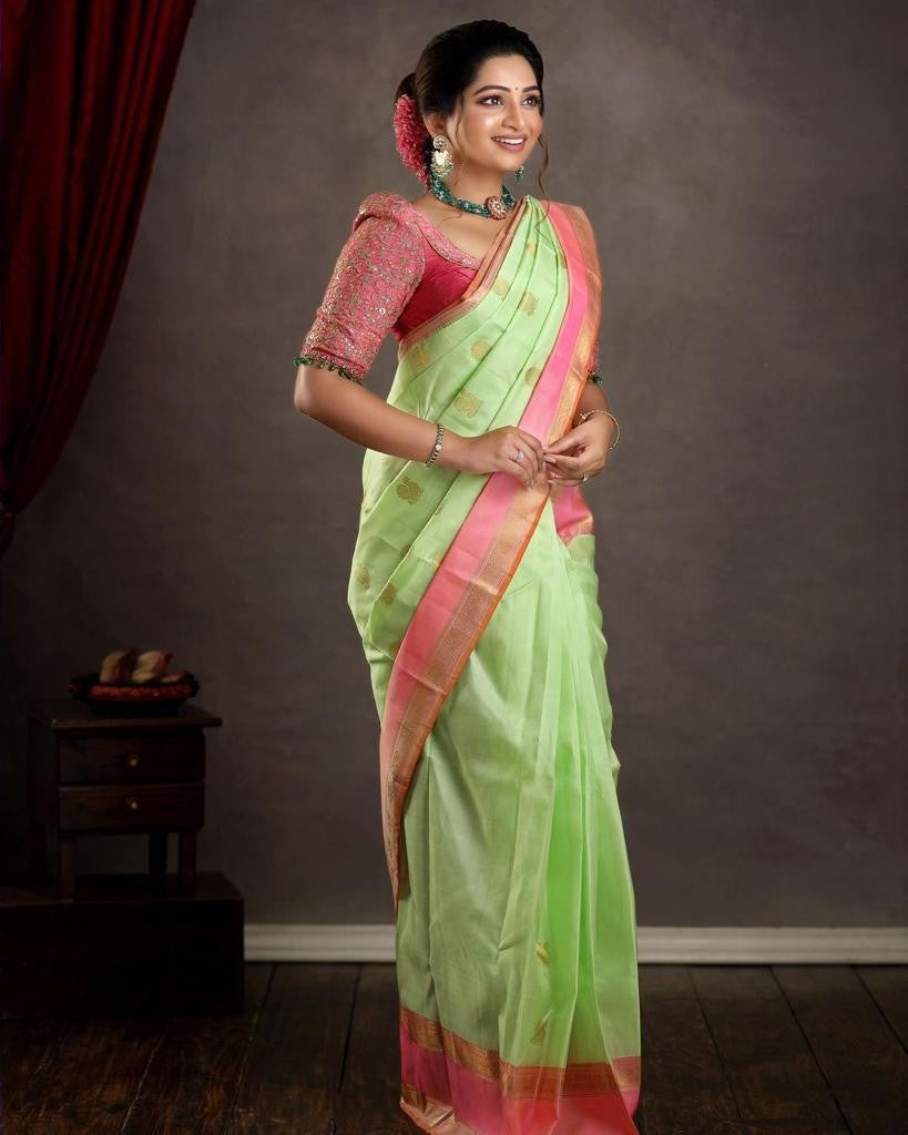 Glowing Pista Soft Silk Saree With Evocative Blouse Piece Shriji