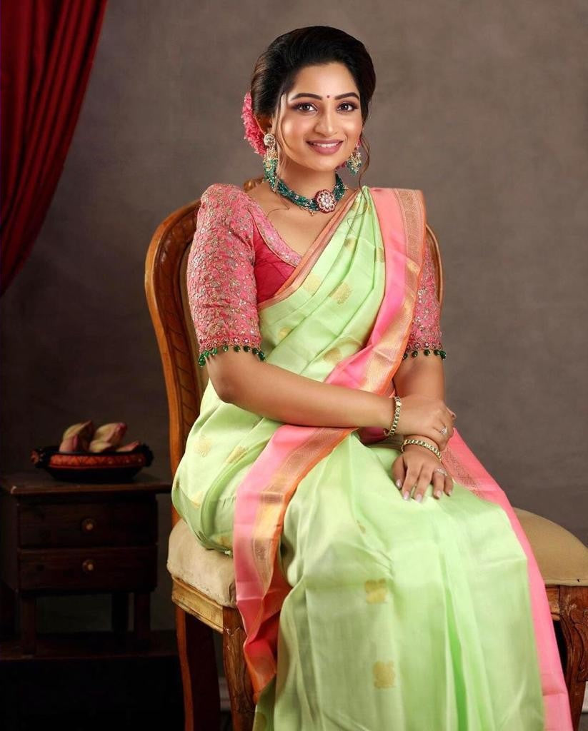 Glowing Pista Soft Silk Saree With Evocative Blouse Piece Shriji