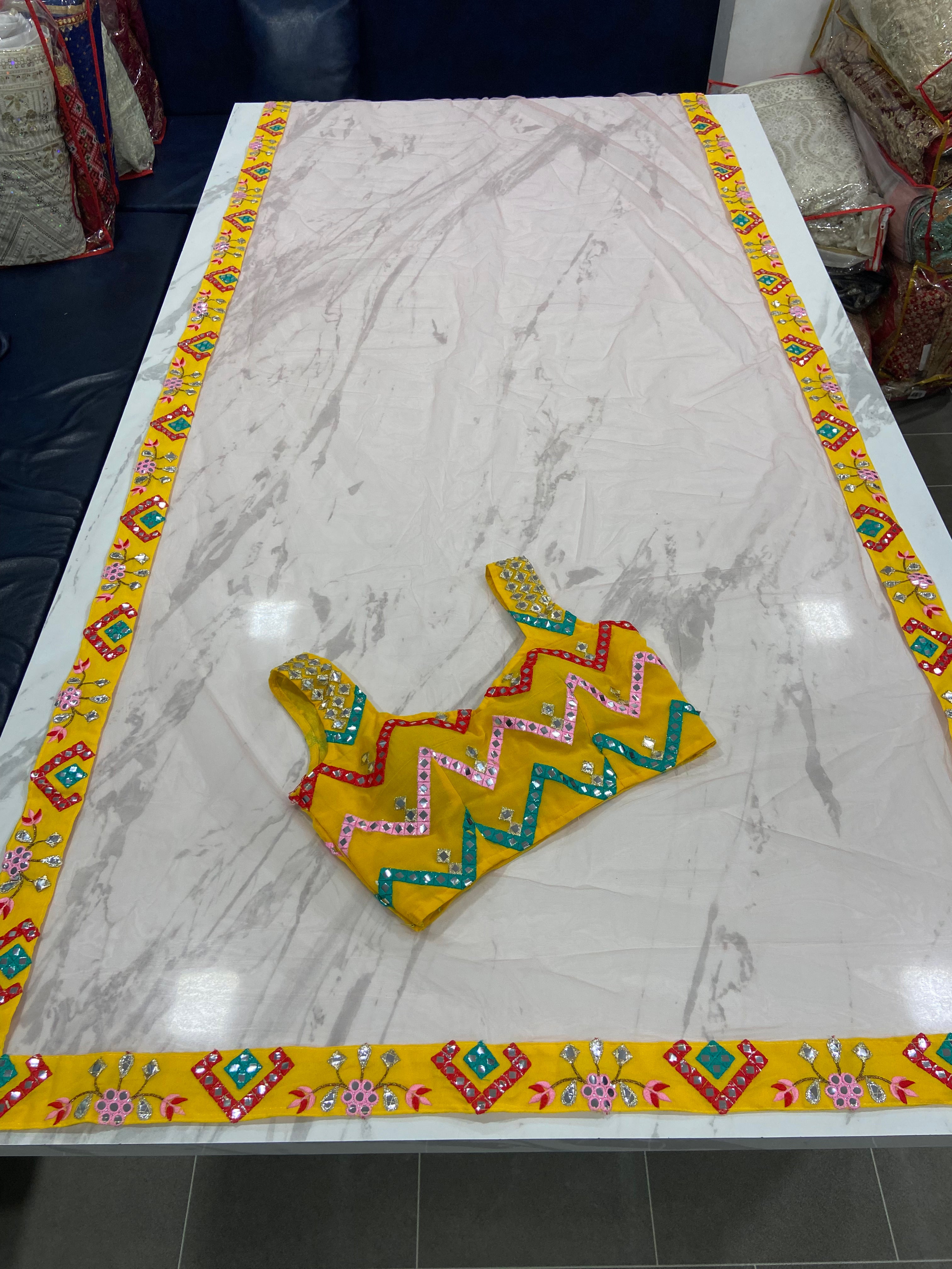 Sleeveless Blouse Mirror Work Lehenga Choli Clothsvilla