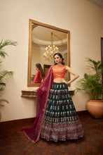 Load image into Gallery viewer, Soft Net Lehenga Choli With Heavy Embroidery Work And Soft Net Dupatta With Lace Border For Women ClothsVilla