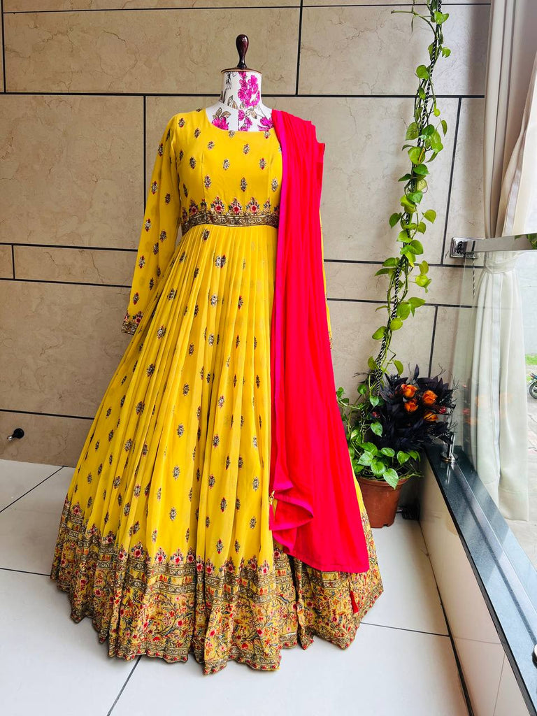 Stylish Yellow Color Embroidery Work Gown Clothsvilla
