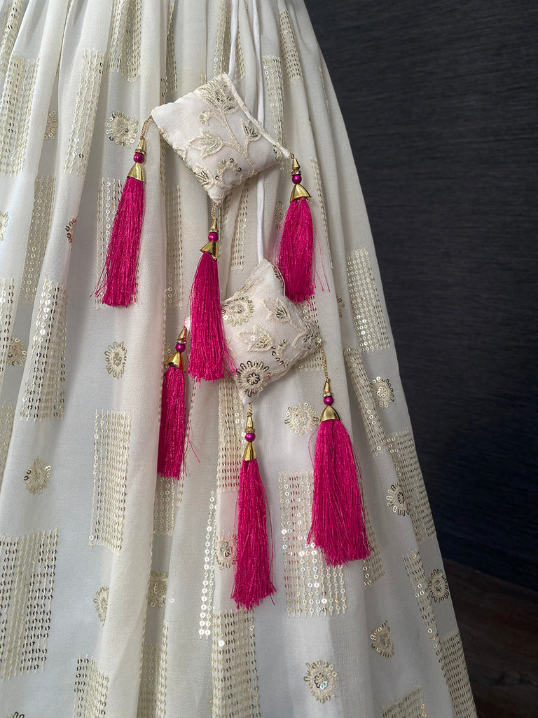 White Color Sequins And Thread Embroidery Work Georgette Lehenga Choli With Muslin Silk Dupatta Clothsvilla