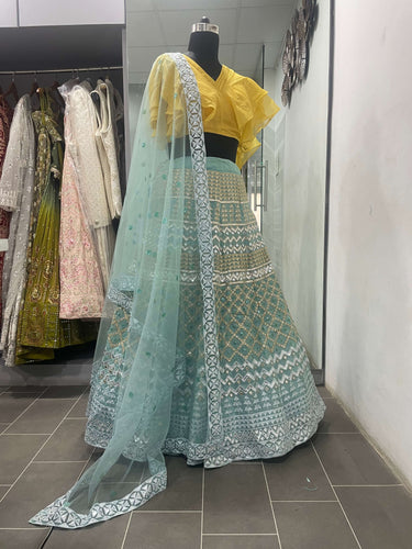 Turquoise Lehenga Choli in Organza With Thread And Sequence Work Clothsvilla