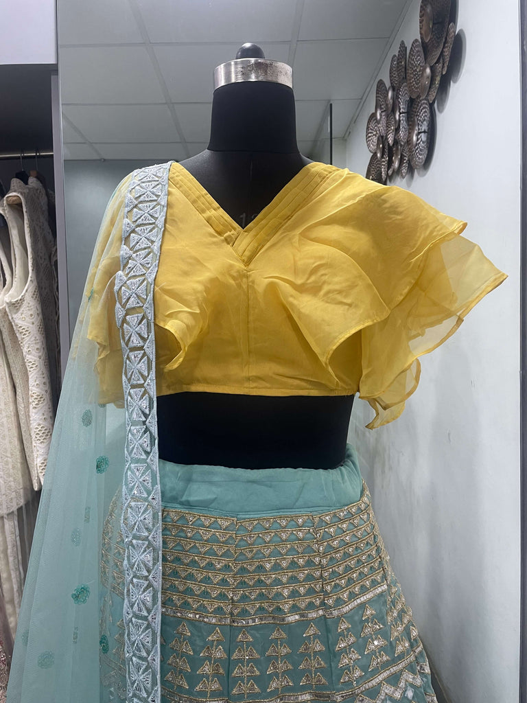 Turquoise Lehenga Choli in Organza With Thread And Sequence Work Clothsvilla