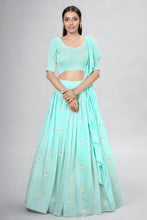 Load image into Gallery viewer, Turquoise Indian Georgette Lehenga Choli With Ruffle Dupatta For Indian Festival &amp; Weddings - Sequence Embroidery Work, Clothsvilla