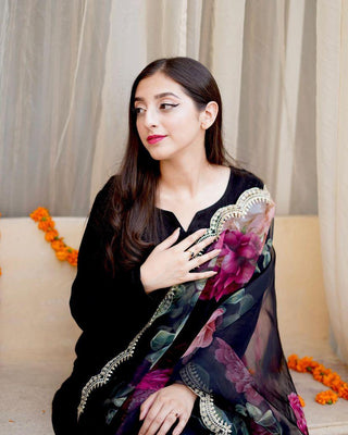 Stylish Black Color Cotton Sharara Suit With Organza Dupatta Clothsvilla