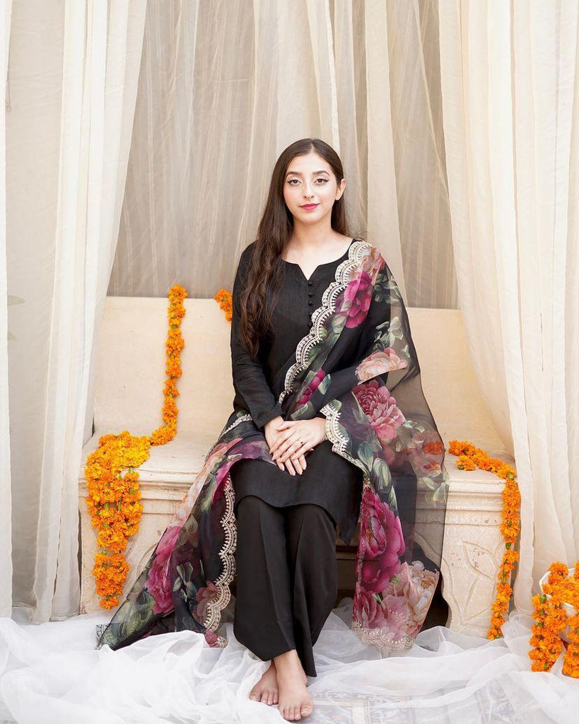 Stylish Black Color Cotton Sharara Suit With Organza Dupatta Clothsvilla