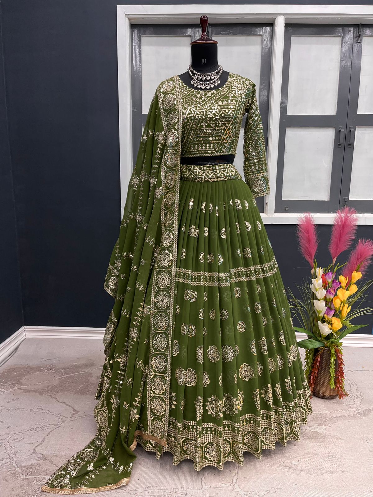 Stylish Mehendi Color Sequence Work Lehenga Choli Clothsvilla